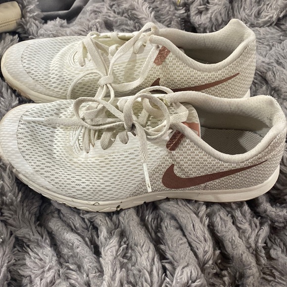 white nike with rose gold swoosh